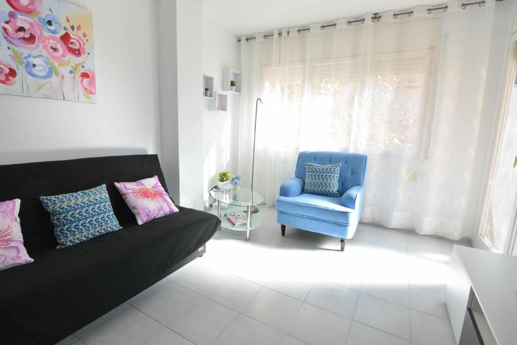Posezení v ubytování Reus Bedrooms 2 habitaciones con baño privado, sin cocina