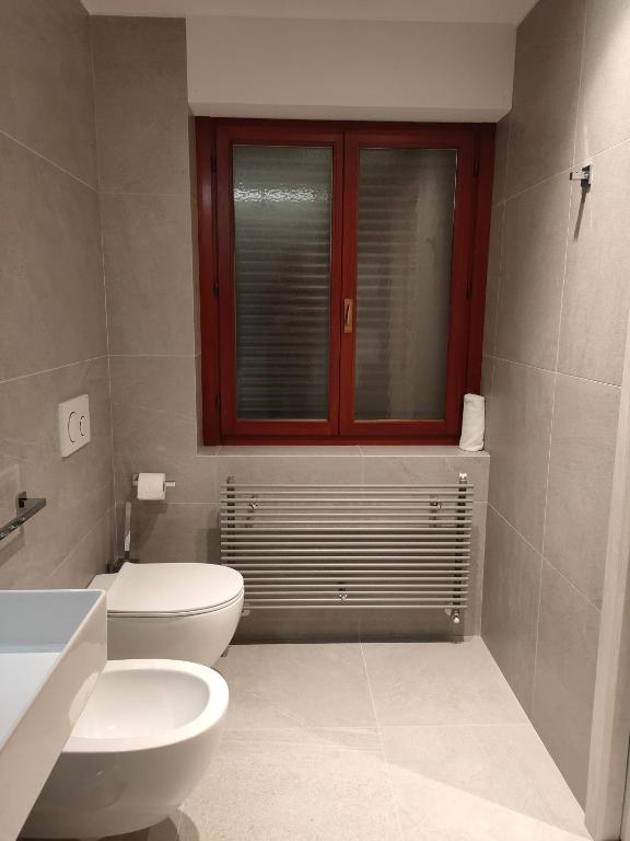 Koupelna v ubytování Albergo Baschera