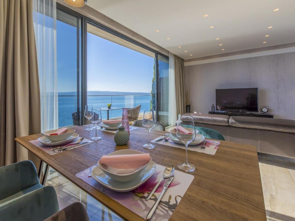 Televízia a/alebo spoločenská miestnosť v ubytovaní Apartments DEL MAR 5