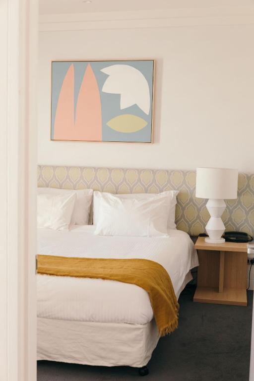 Postel nebo postele na pokoji v ubytování Hotel Ravesis