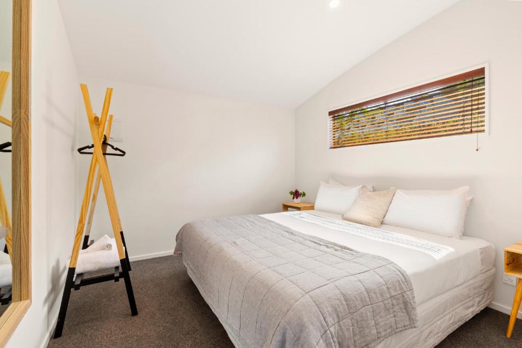 Postel nebo postele na pokoji v ubytování Stay of Queenstown