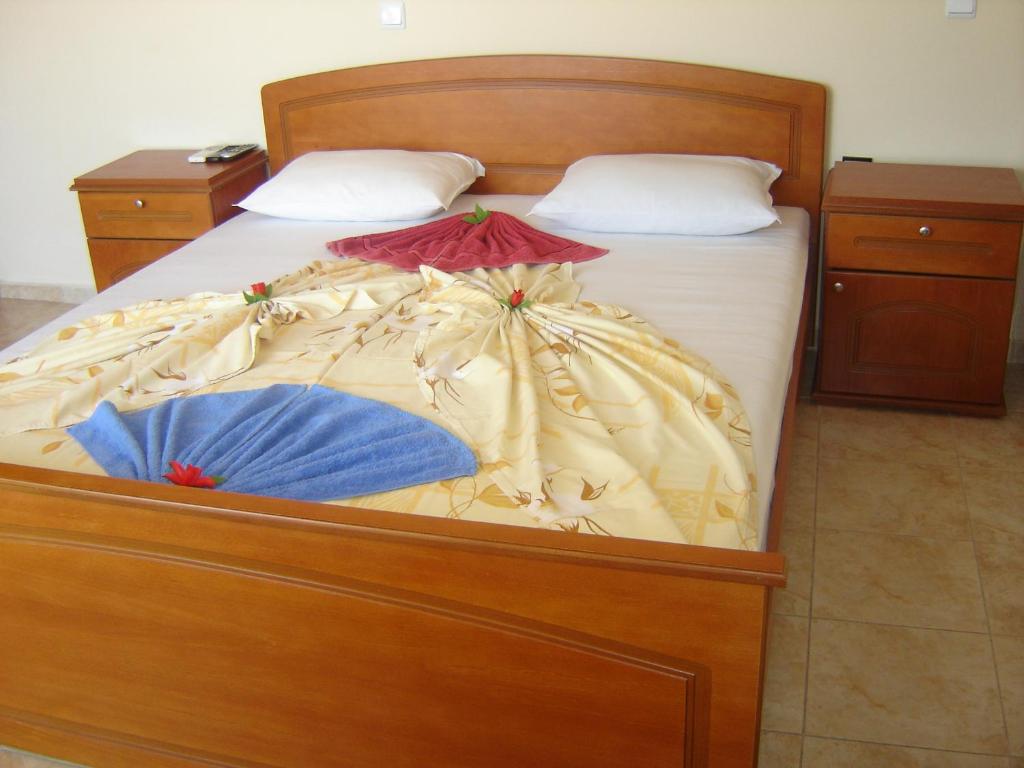 Кровать или кровати в номере Family Hotel Chris