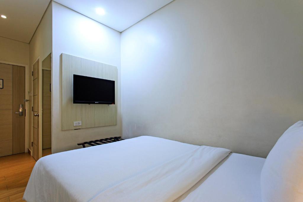 TV a/nebo společenská místnost v ubytování Hamersons Hotel Cebu