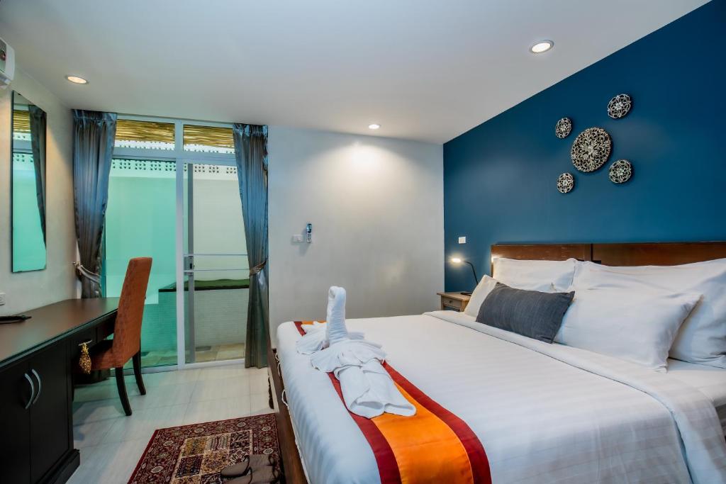 Ein Bett oder Betten in einem Zimmer der Unterkunft Kata Tranquil Villa - SHA Plus