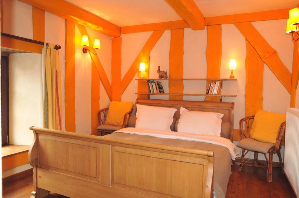 Postel nebo postele na pokoji v ubytování B&B Le Clos de la Fontaine