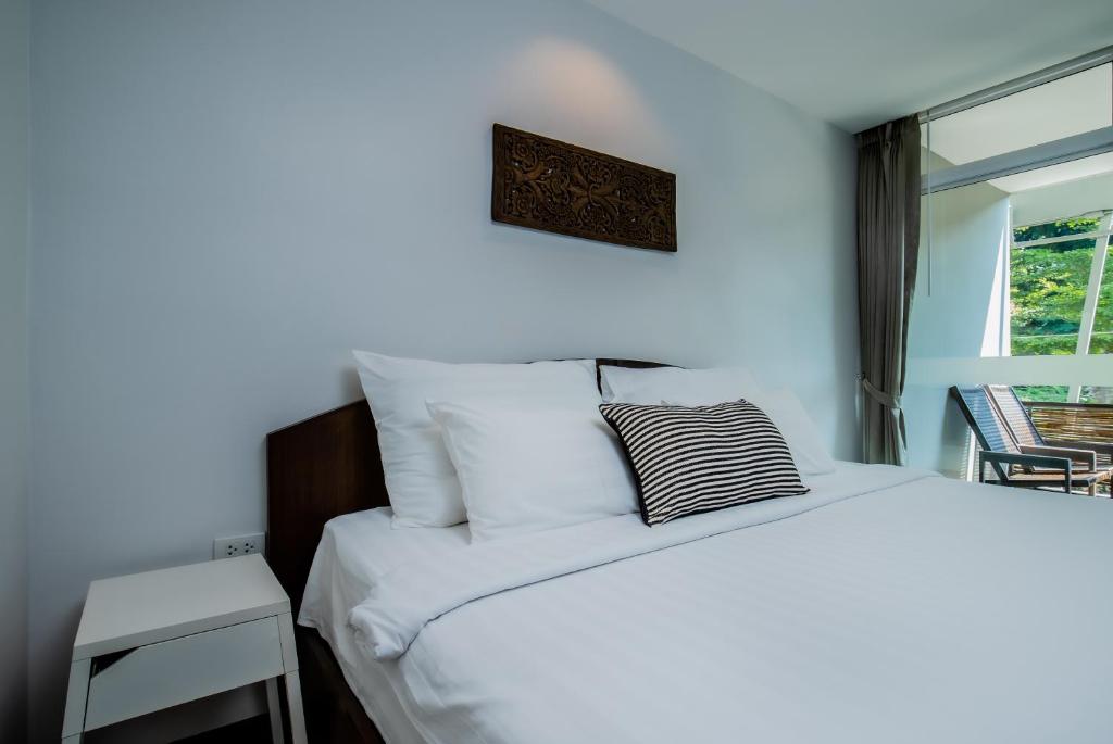 Ein Bett oder Betten in einem Zimmer der Unterkunft Kata Tranquil Villa - SHA Plus