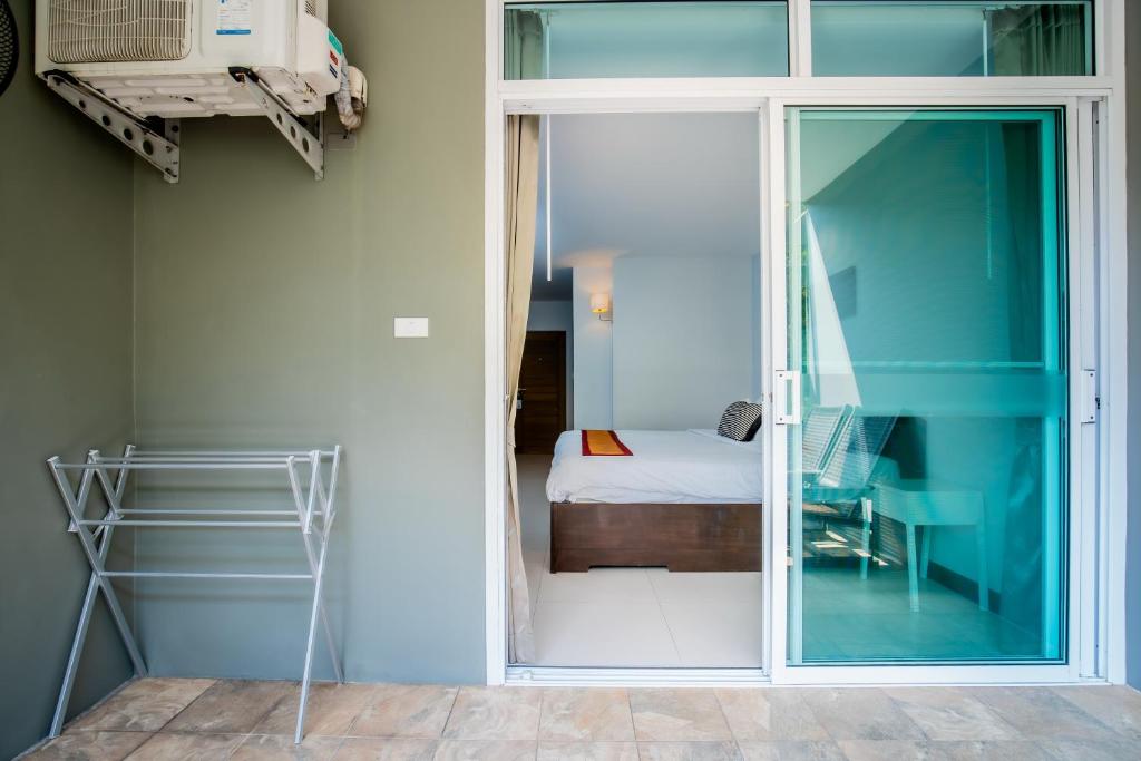 Ein Bett oder Betten in einem Zimmer der Unterkunft Kata Tranquil Villa - SHA Plus
