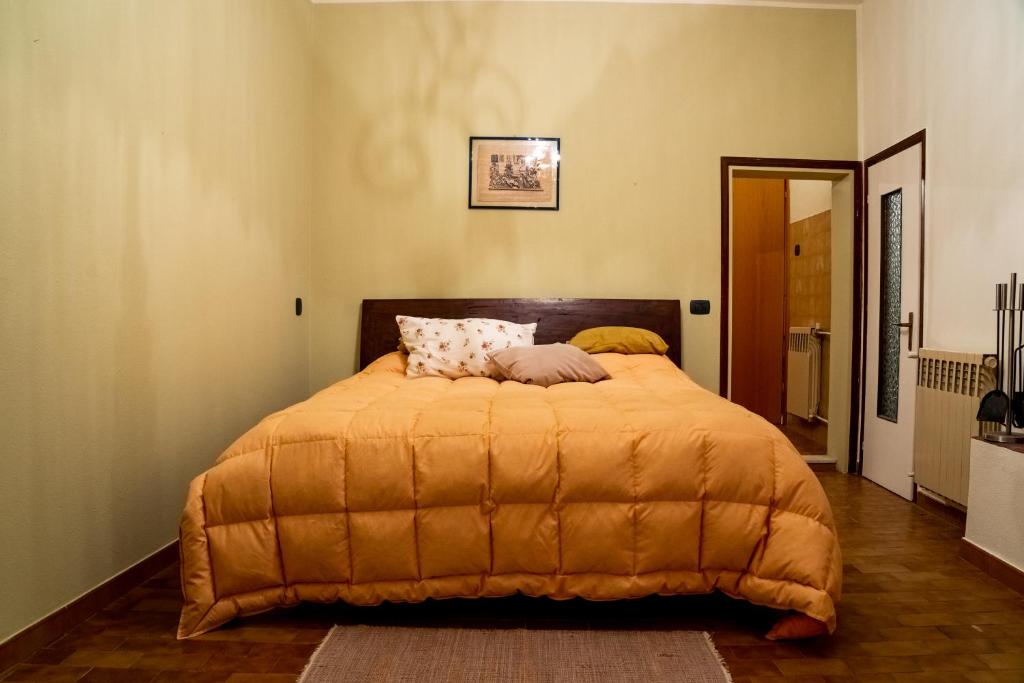 Кровать или кровати в номере Corte La Nespola