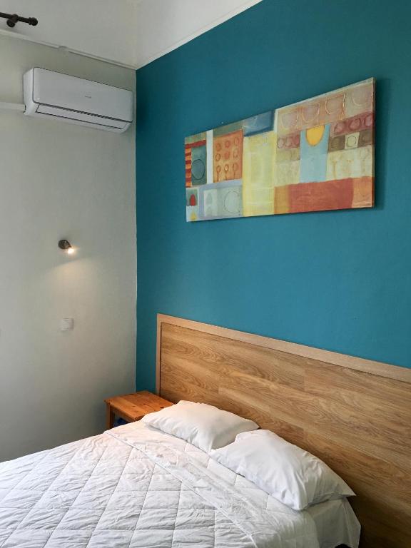 Postel nebo postele na pokoji v ubytování Hotel Kastoria