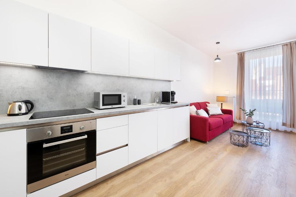 Kuchyň nebo kuchyňský kout v ubytování Prague Roof Apartments
