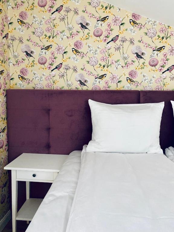 Postel nebo postele na pokoji v ubytování Apartamenty Nova 22