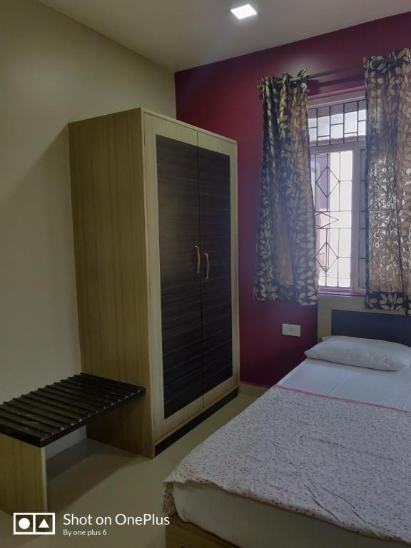Postel nebo postele na pokoji v ubytování Guesthouse Sakina Colva