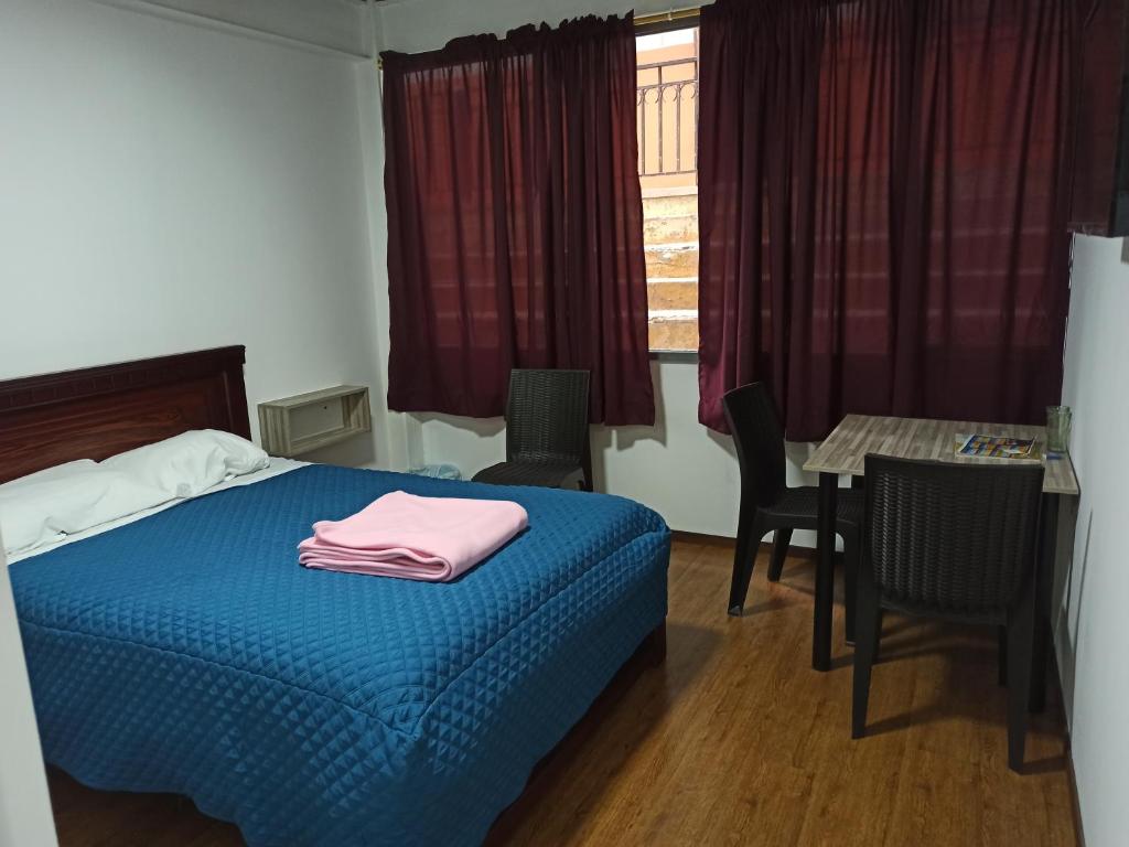 Postel nebo postele na pokoji v ubytování Habitaciones Alkimya