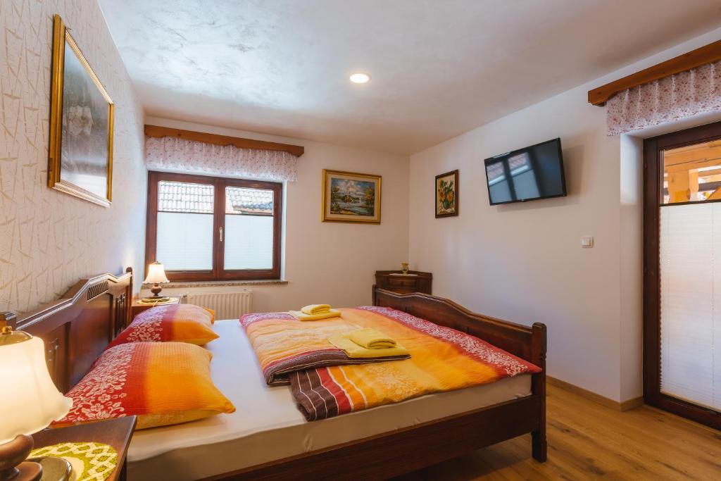 Postel nebo postele na pokoji v ubytování Apartment Ledrar