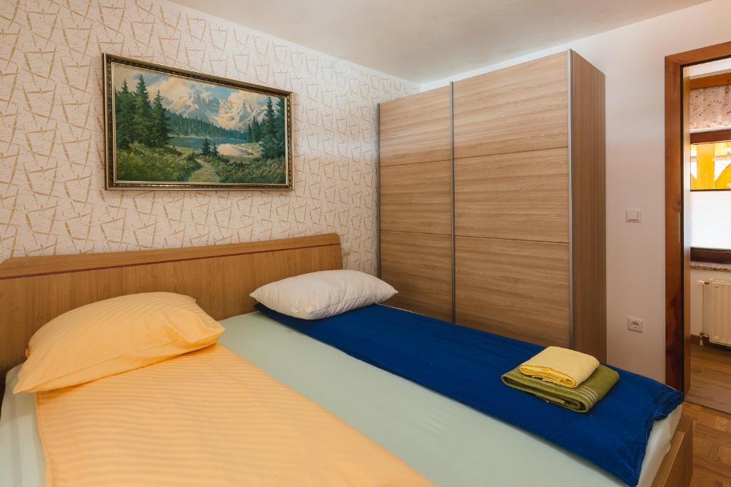 Postel nebo postele na pokoji v ubytování Apartment Ledrar