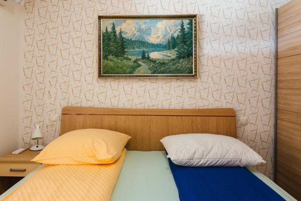 Postel nebo postele na pokoji v ubytování Apartment Ledrar