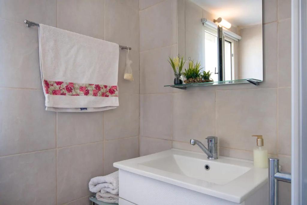 Koupelna v ubytování Designed Studio Apartment