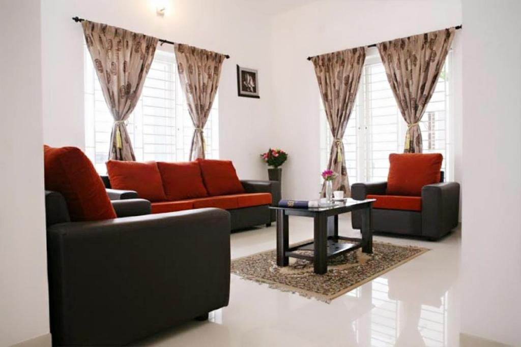Posezení v ubytování Swarna Sudarshan Service Apartments Sholinganallur