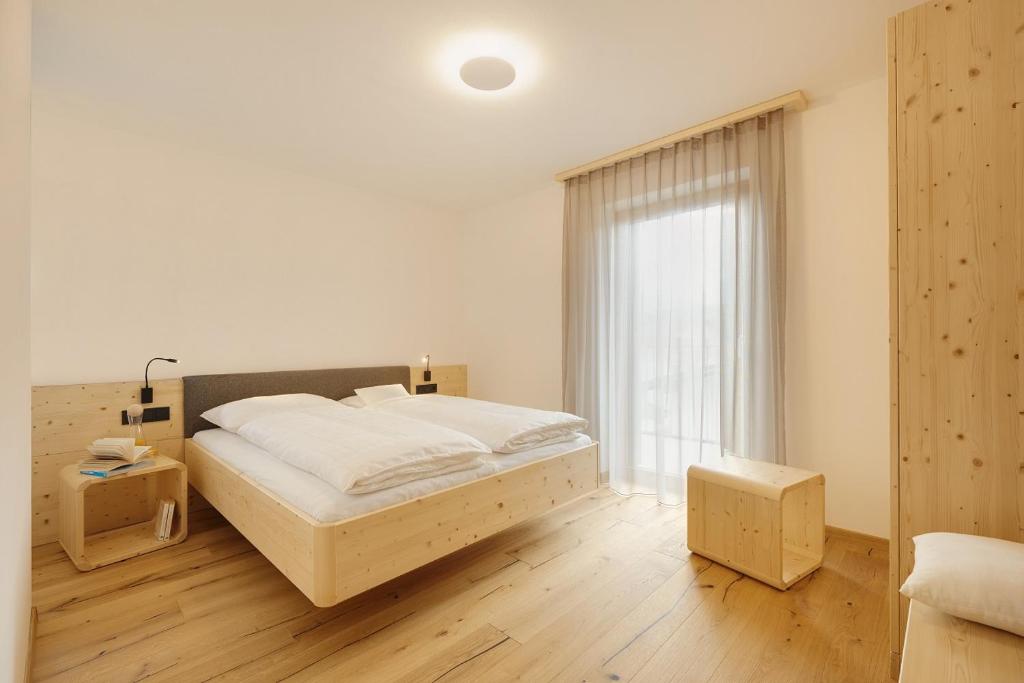 Postel nebo postele na pokoji v ubytování Ariala Apartments