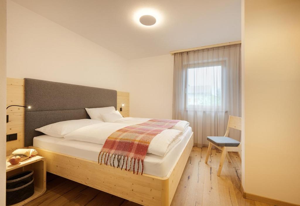 Postel nebo postele na pokoji v ubytování Ariala Apartments