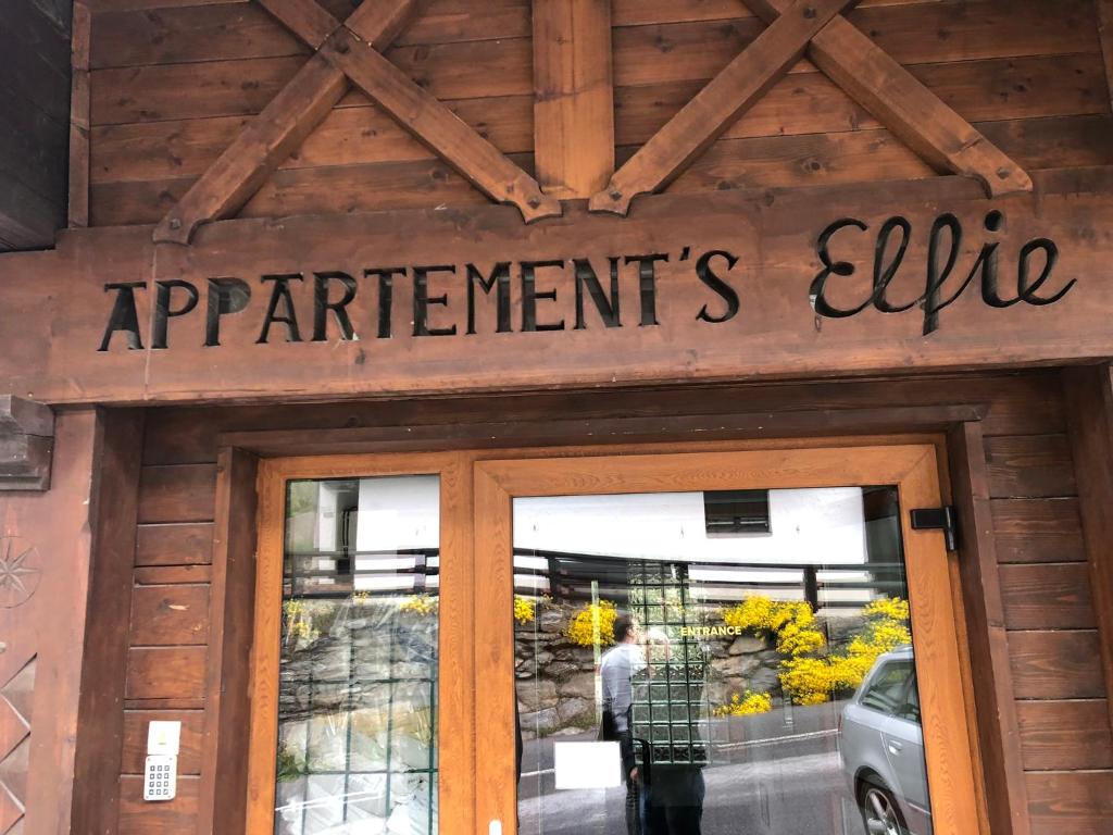 a sign over the door of a department store at Chalet Elfie in Sankt Anton am Arlberg