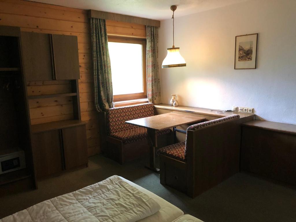 Postel nebo postele na pokoji v ubytování Chalet Elfie