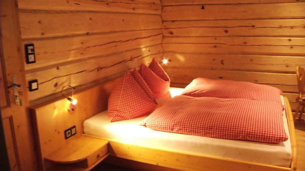 Posteľ alebo postele v izbe v ubytovaní Alpenchalets Weissenbacher