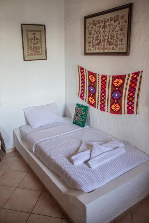 Postel nebo postele na pokoji v ubytování Koilon Apartments