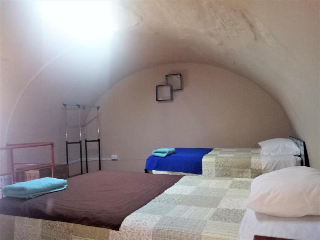 Tempat tidur dalam kamar di Casona Moya