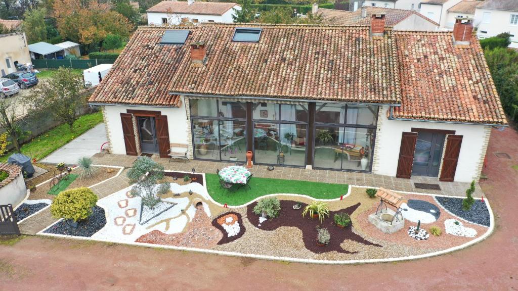 an aerial view of a house with a garden at Au gué du bois in Neuville-de-Poitou