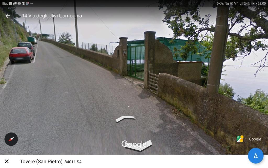 a car parked on the side of a road at GIARDINO SUL MARE in Amalfi