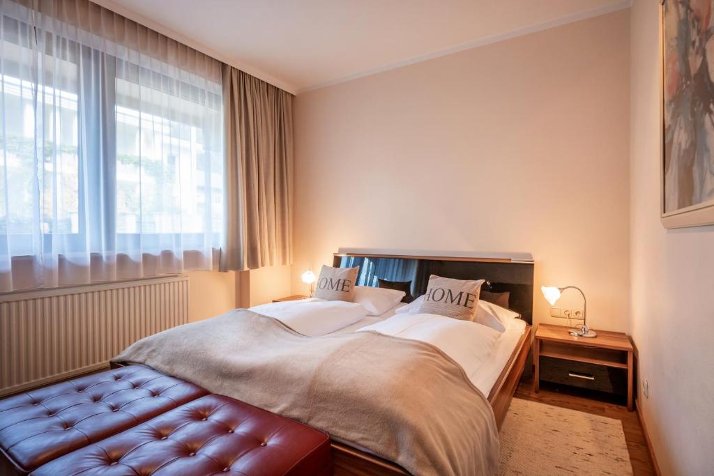 Postel nebo postele na pokoji v ubytování Aparthotel Andreas Hofer