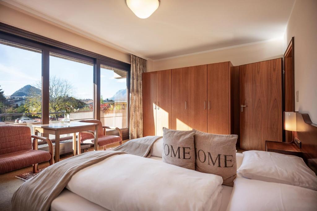 Postel nebo postele na pokoji v ubytování Aparthotel Andreas Hofer