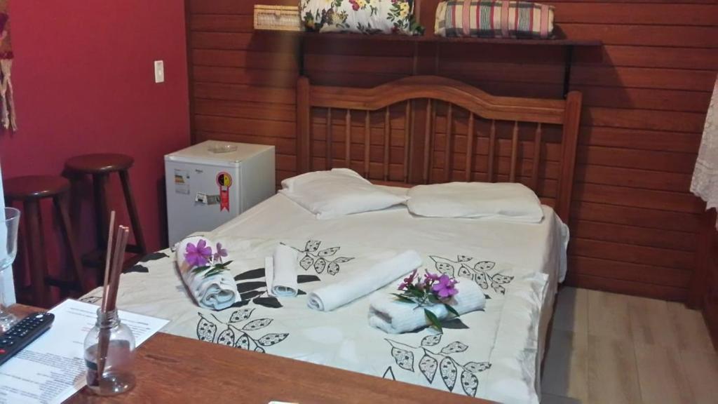 Ліжко або ліжка в номері Chales do Antonio