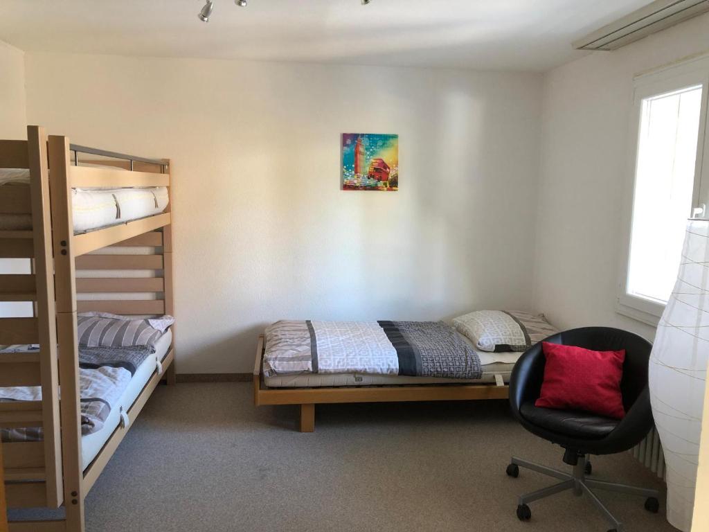 Postel nebo postele na pokoji v ubytování Sursilvana 18 (317 Ma)