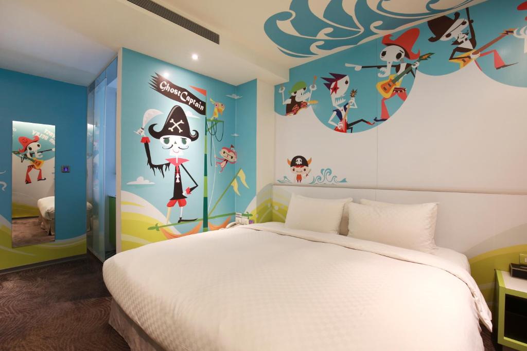 Postel nebo postele na pokoji v ubytování CityInn Hotel Plus - Taichung Station Branch