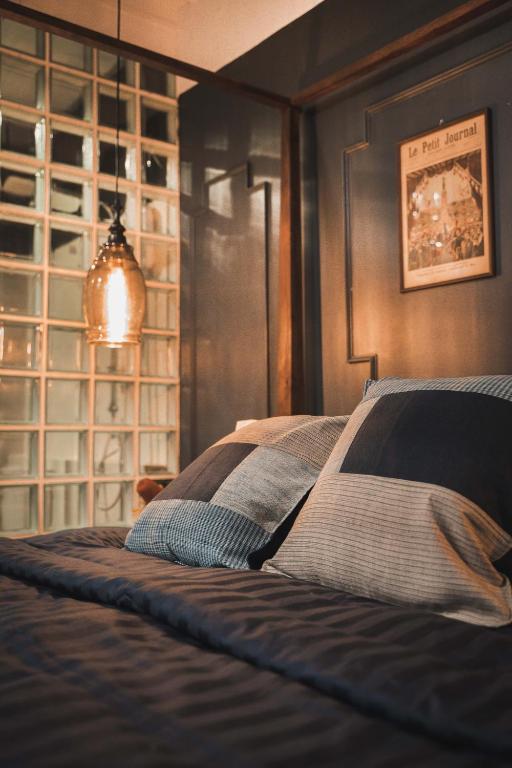 Letto o letti in una camera di Mojo Old Town Phranakorn