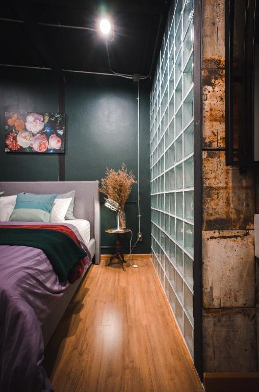 Letto o letti in una camera di Mojo Old Town Phranakorn