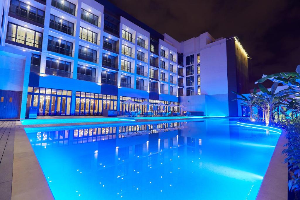 The swimming pool at or close to Millennium Executive Apartments Salalah