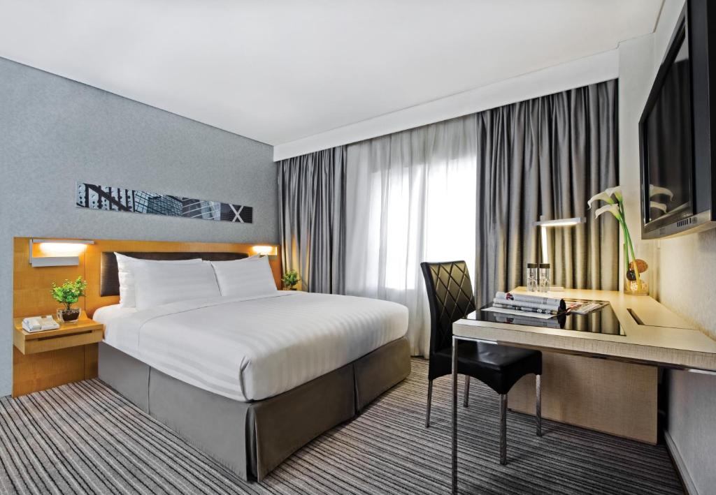 Postel nebo postele na pokoji v ubytování Kew Green Hotel Wanchai Hong Kong