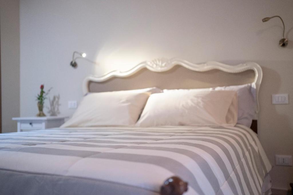 Postel nebo postele na pokoji v ubytování Il Palazzetto