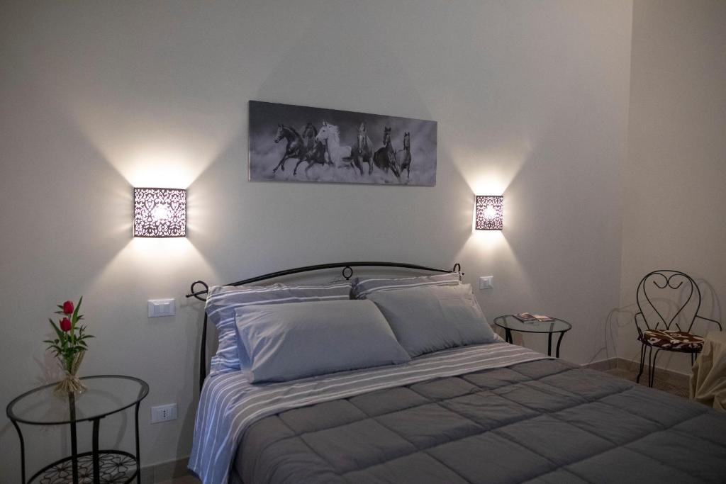 Postel nebo postele na pokoji v ubytování Il Palazzetto