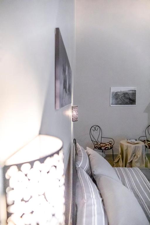 Postel nebo postele na pokoji v ubytování Il Palazzetto