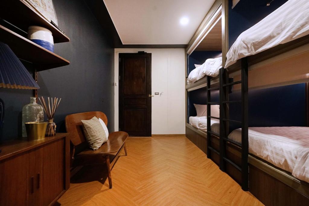 Letto o letti in una camera di Mojo Old Town Phranakorn