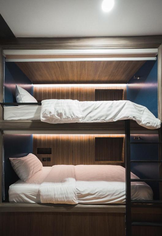 Letto o letti in una camera di Mojo Old Town Phranakorn