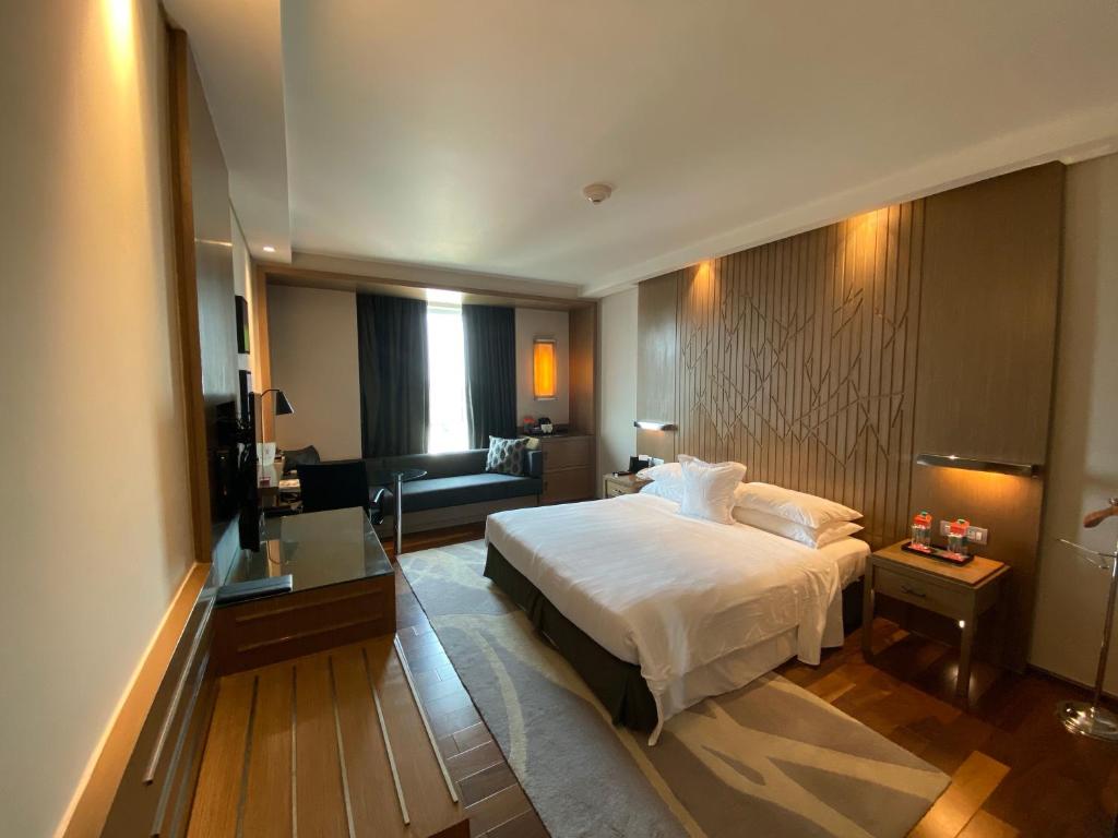 Postel nebo postele na pokoji v ubytování Welcomhotel by ITC Hotels, Richmond Road, Bengaluru