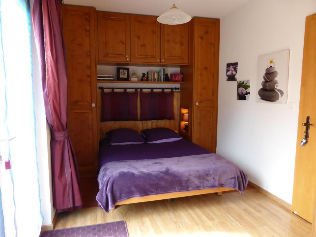 Postel nebo postele na pokoji v ubytování B&B Les Acacias