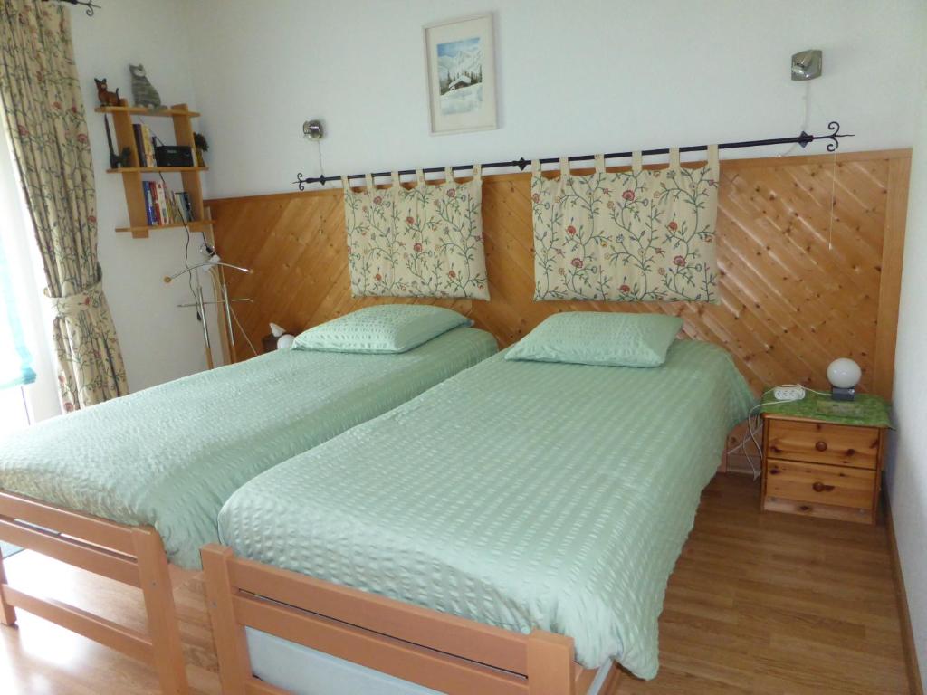Postel nebo postele na pokoji v ubytování B&B Les Acacias