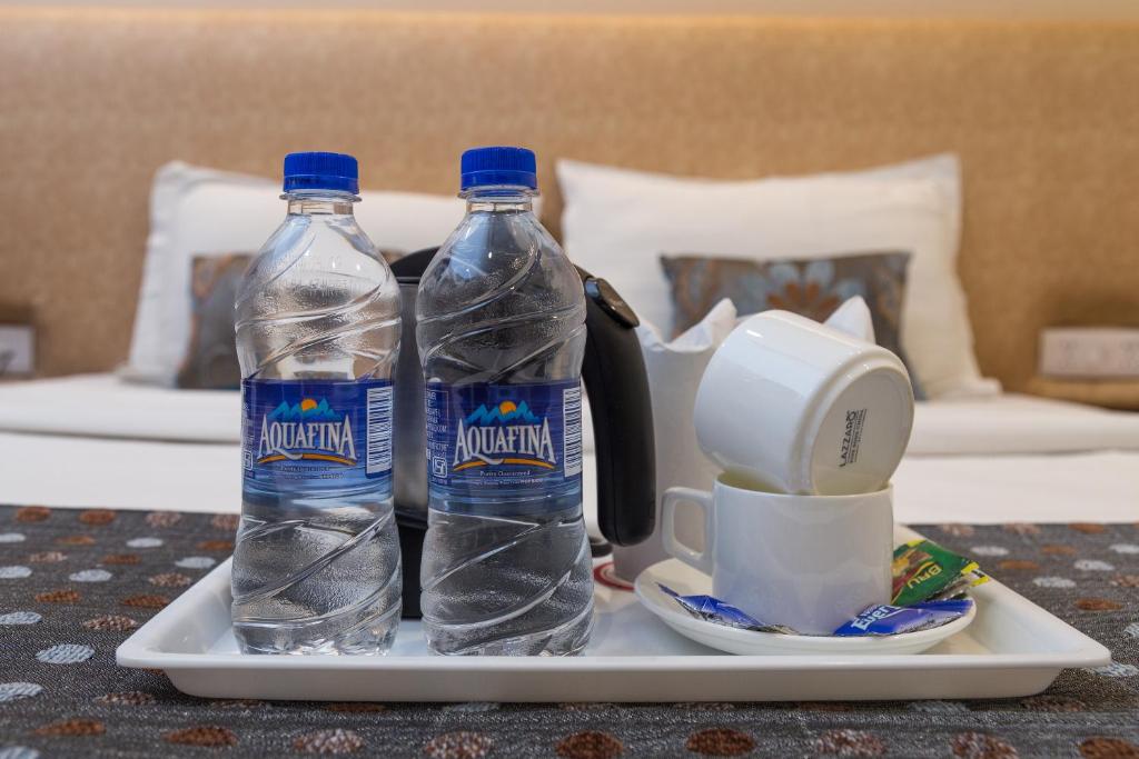 Postel nebo postele na pokoji v ubytování Rupam Hotel