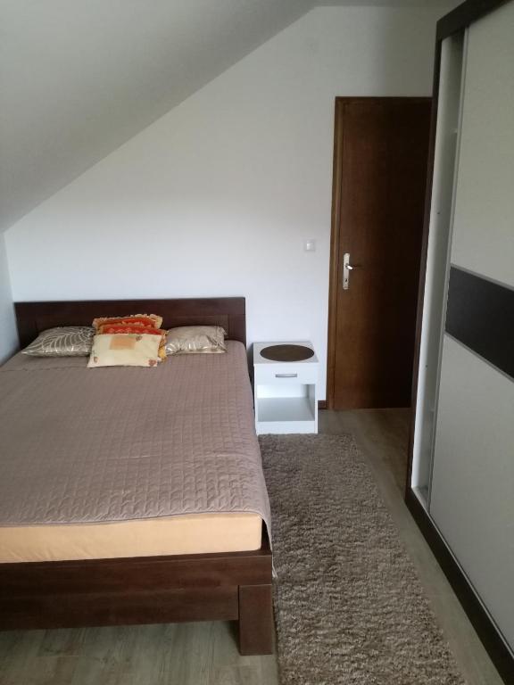 Postel nebo postele na pokoji v ubytování Apartman Vukan